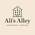 A logo for a company named Ali's Alley Apartment Complex.