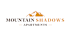 a logo for mountain shadows apartments