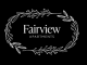 a logo with a wreath of leaves on a black background