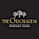 The logo for The Orchards Apartment Homes features three trees.