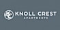 Knoll Crest Apartments logo on a grey background.
