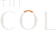A green sign with white letters that read "THE CO".