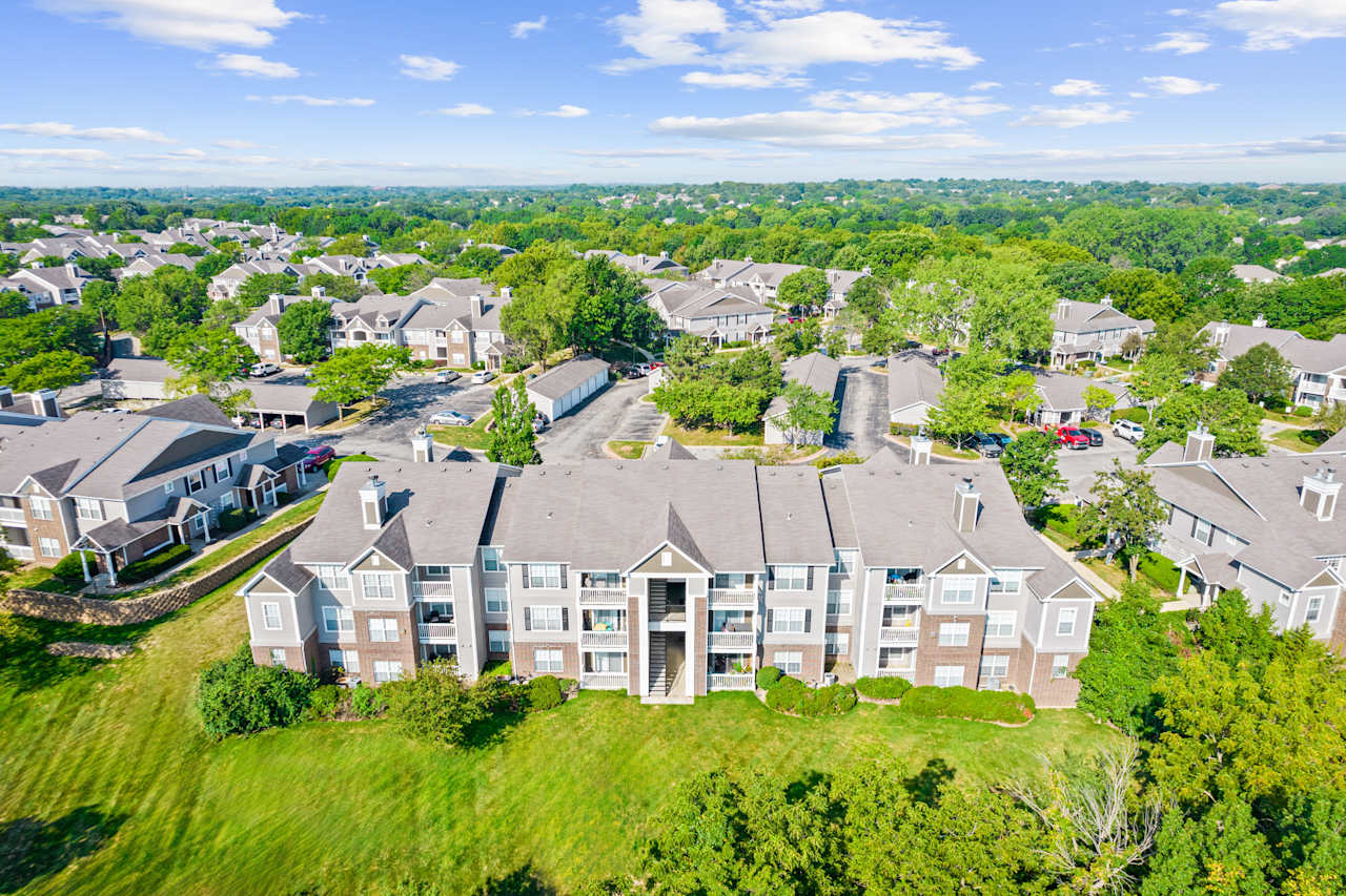 Building exterior at Stonebriar Woods Apartment Homes on W. 120th Street in Overland Park