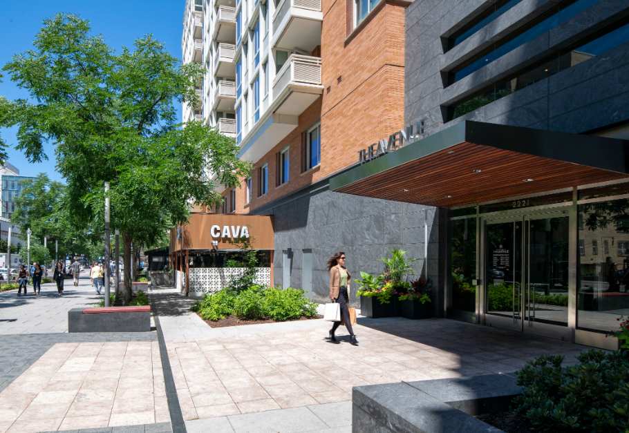 Residences on the Avenue street-level exterior by retail - Washington, DC