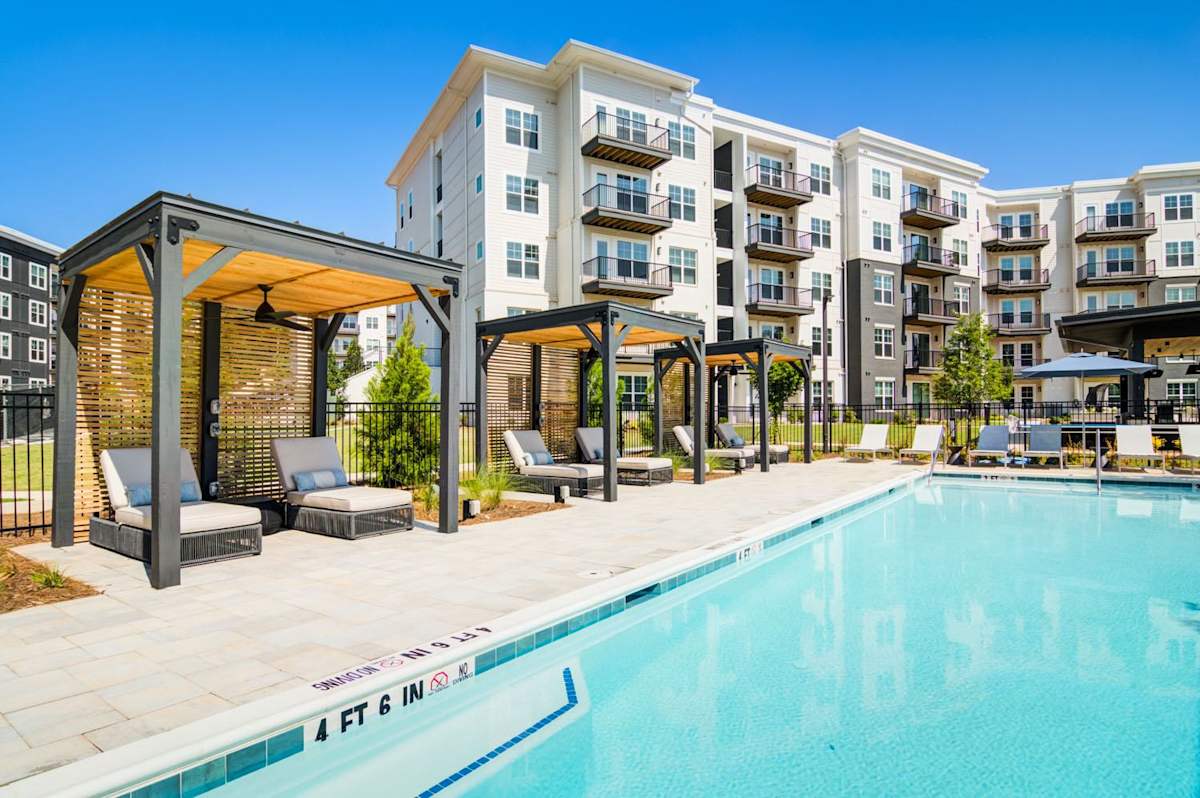 The Collier Sugar Hill Luxury Apartments swimming pool and courtyard - Sugar Hill, GA