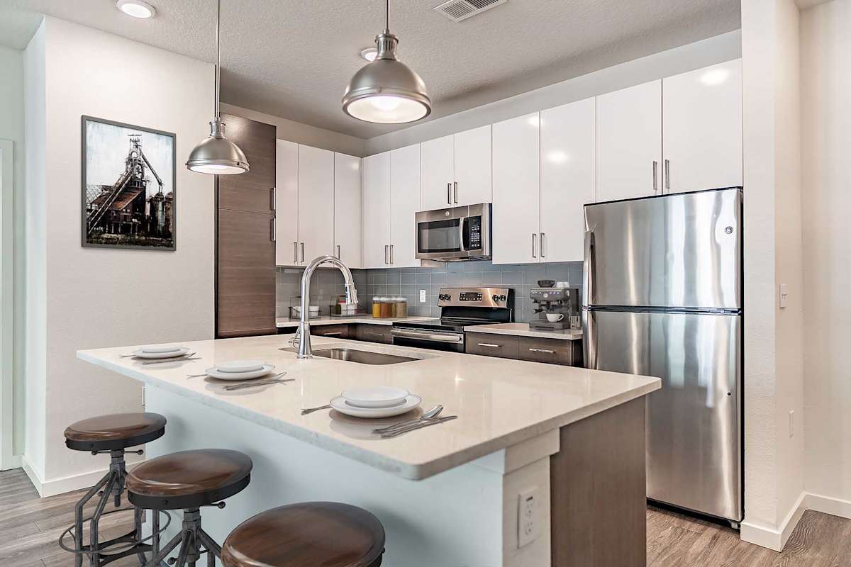 Havana Square Apartments kitchen with large island - Tampa, FL