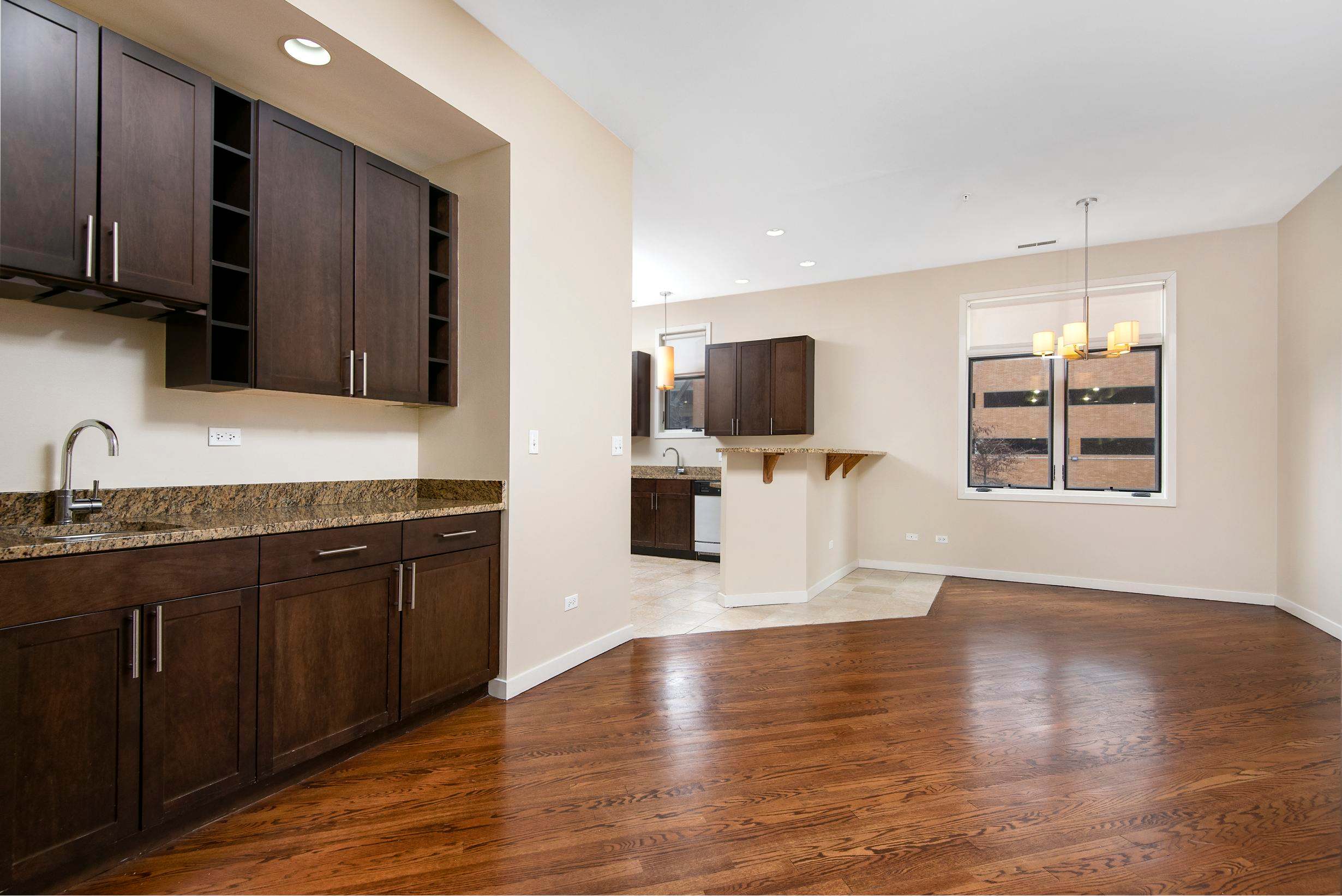 Oak Park Place apartment kitchen with granite countertop - Oak Park, IL