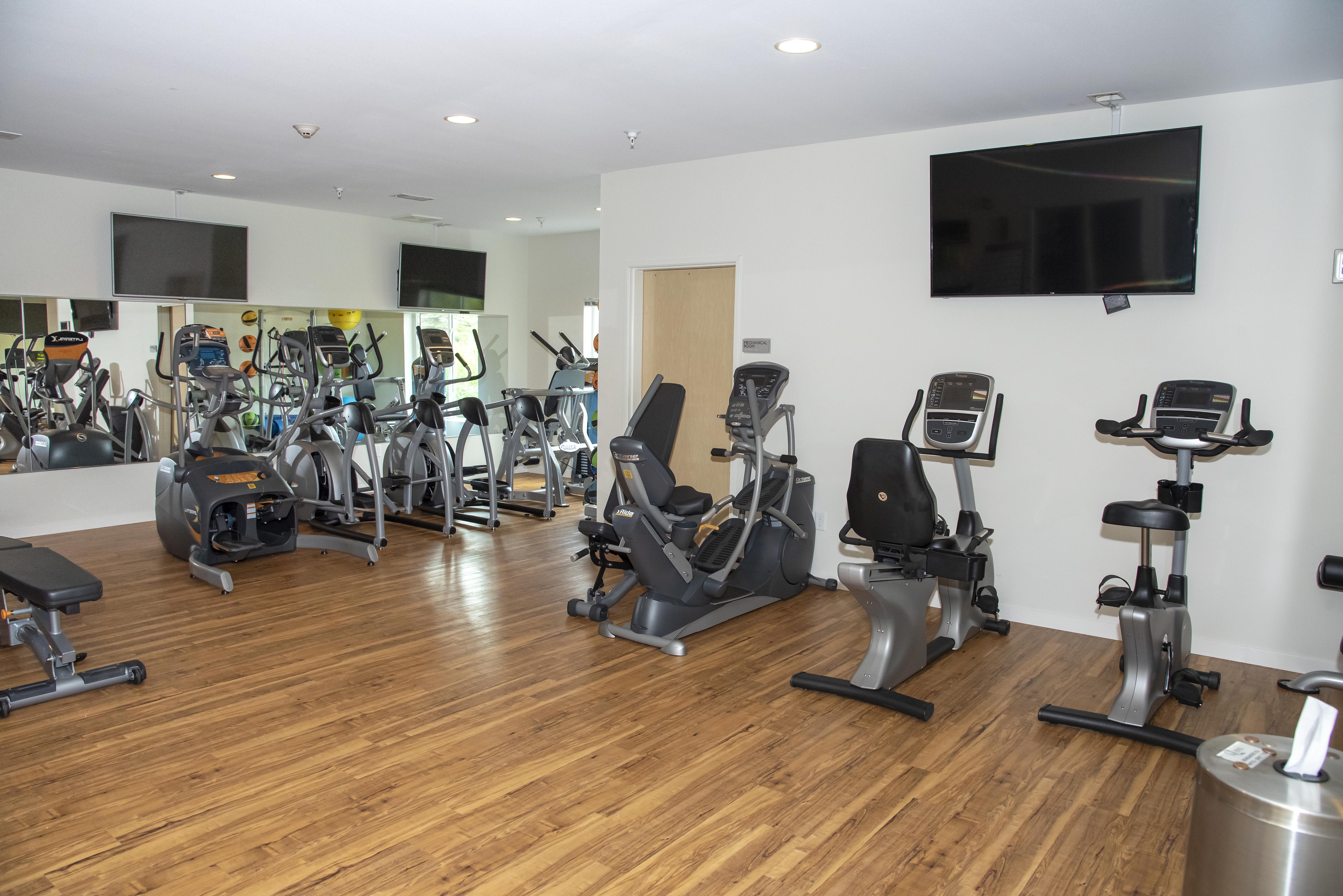 The Gardens Apartments cardio area in fitness center - Grand Forks, ND