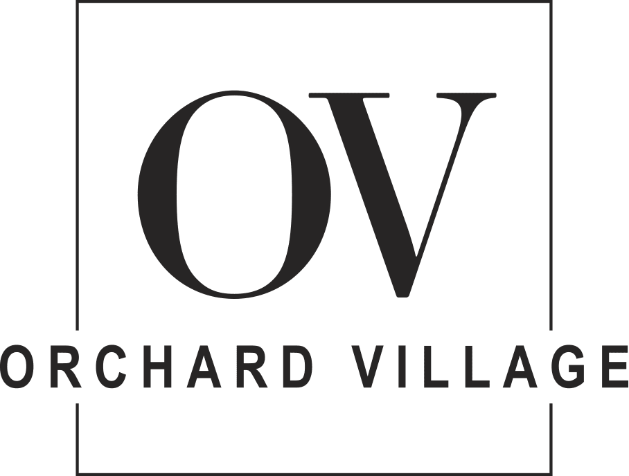 A black and white image of a logo with the letters "OV" and the words "ORCHARD VILLAGE".