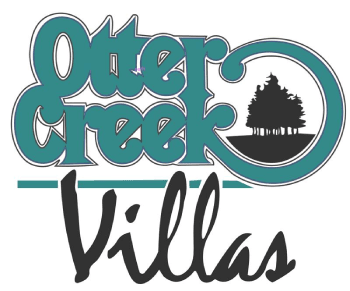 A logo for Outer Creek Villas featuring a tree and a stylized creek.