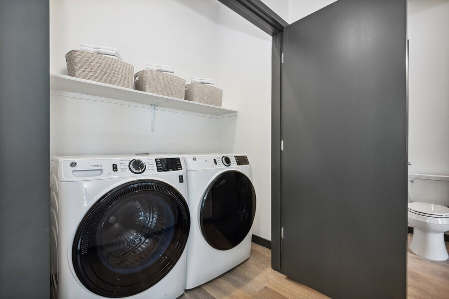 Laundry room at Scottsdale Entrada Apartments