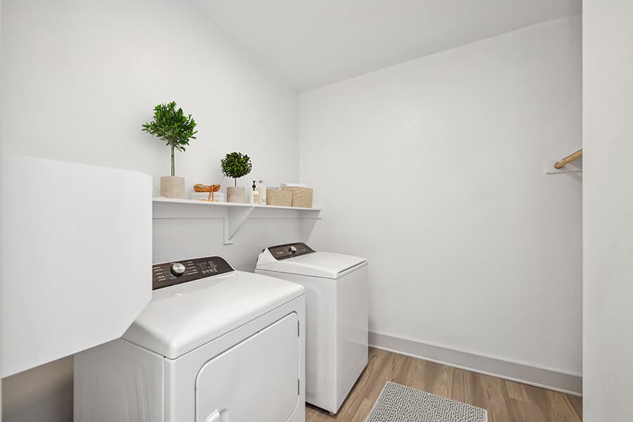 Laundry room at Aubrey Junction Apartments
