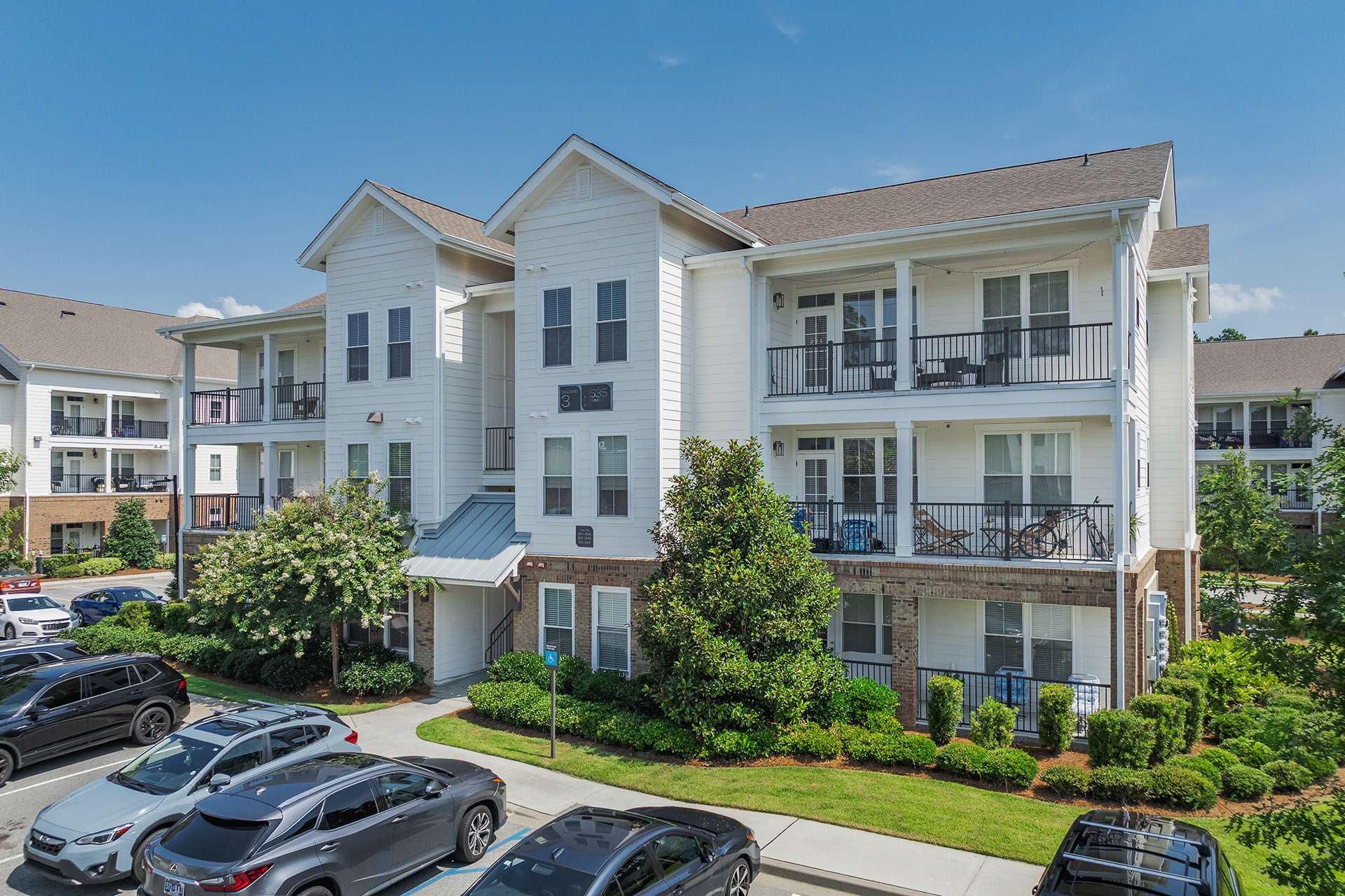 The Grove at Carolina Park Apartments exterior with parking - Mount Pleasant, SC