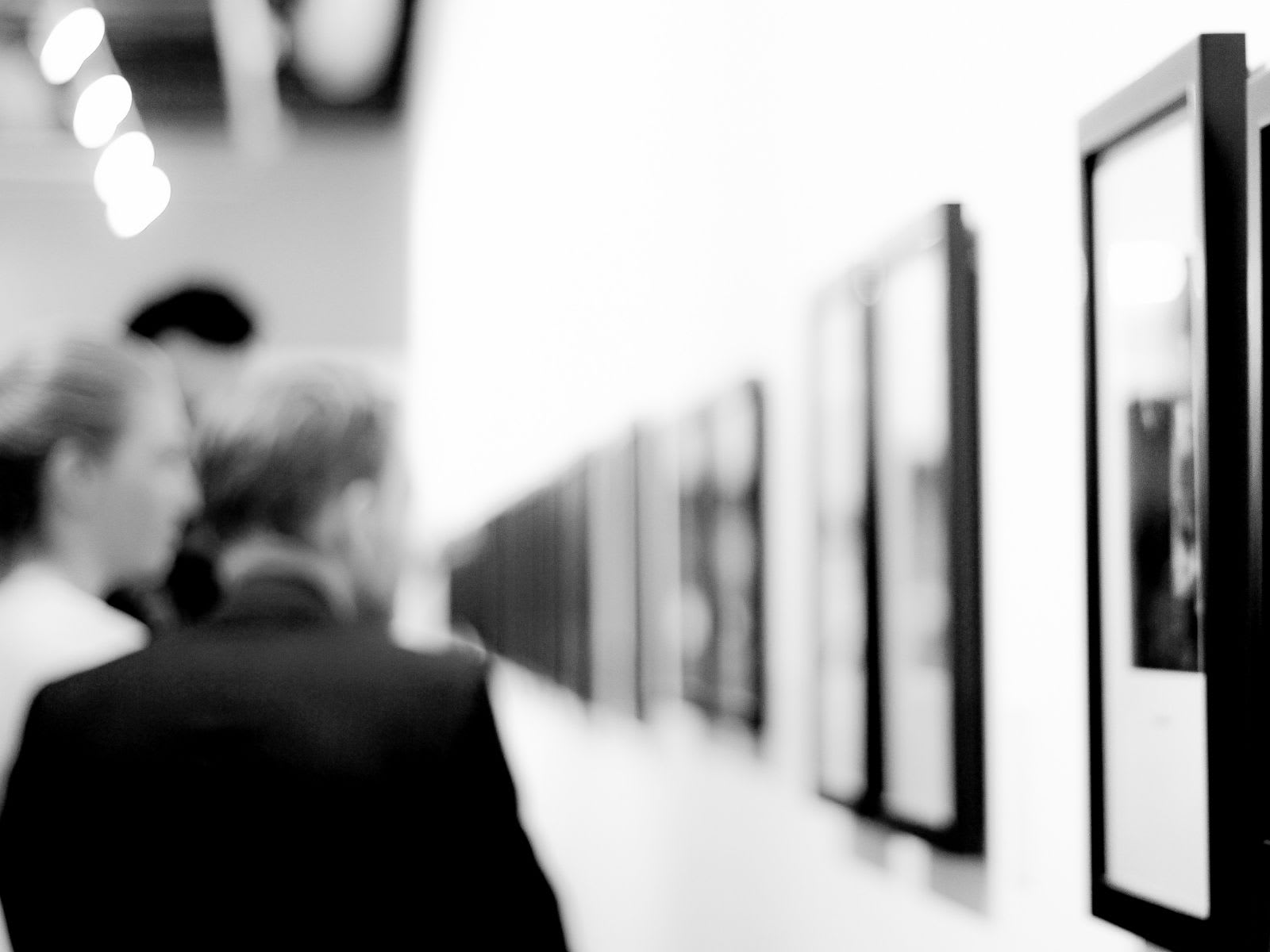 People at a gallery exhibition