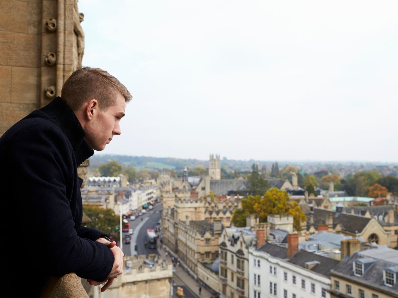 Male tourist looking out at Oxford