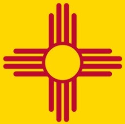 an orange and red sun logo on a yellow background