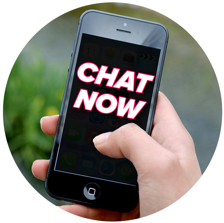 A hand holding a smartphone with the screen displaying "CHAT NOW".
