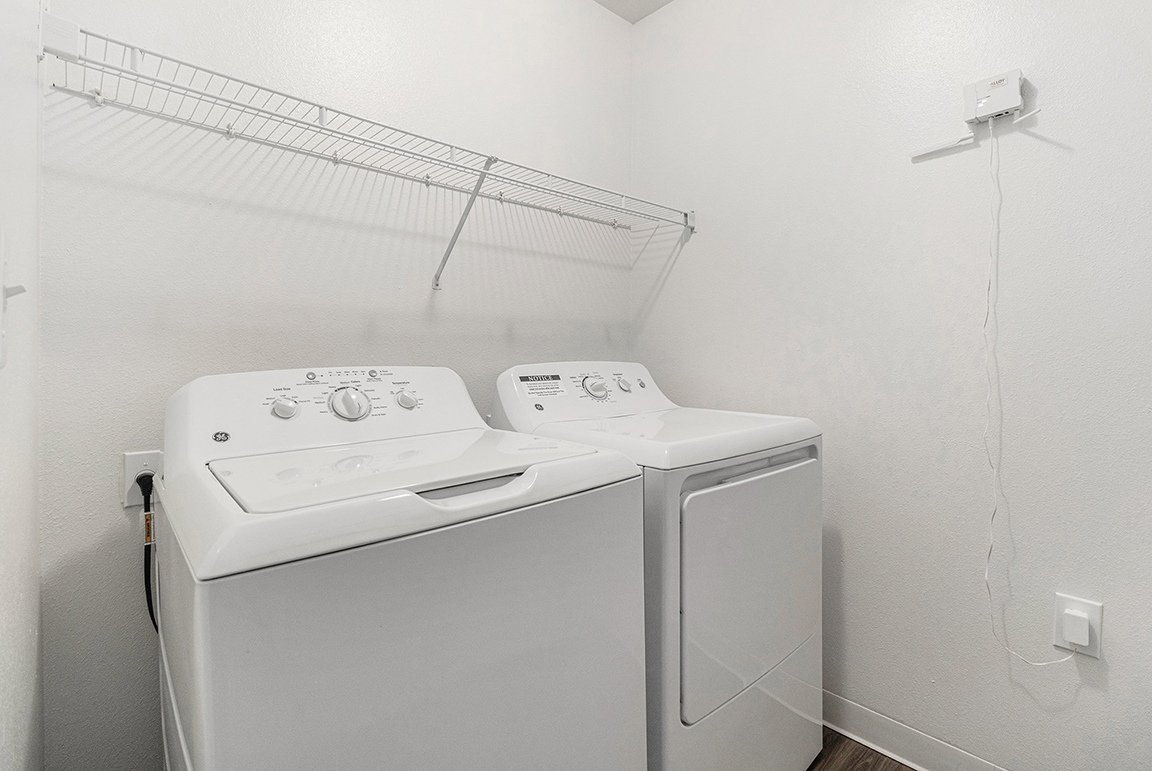Laundry room at Autumn Lakes Apartments and Townhomes (3 of 4)