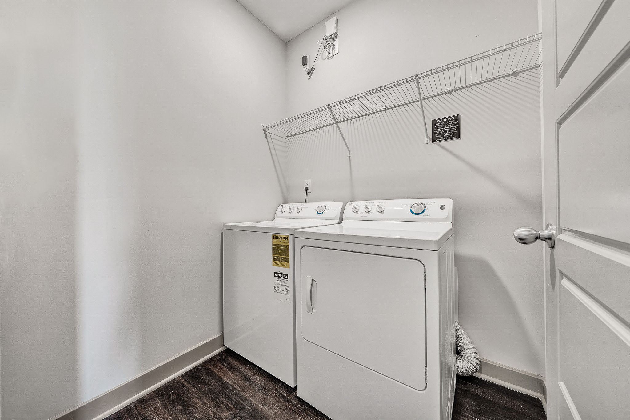 Laundry room at Avellan Springs Apartments