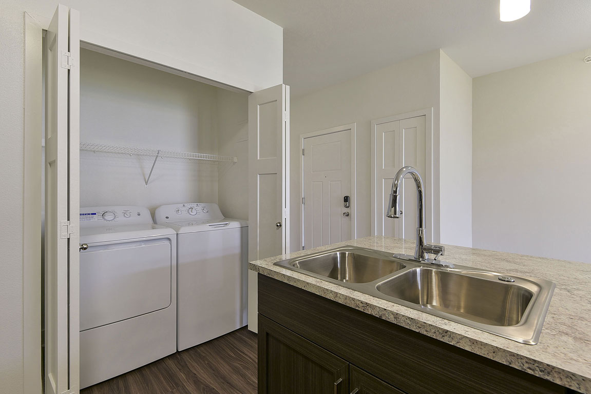 Laundry room at Copper Creek Apartment Homes (2 of 2)