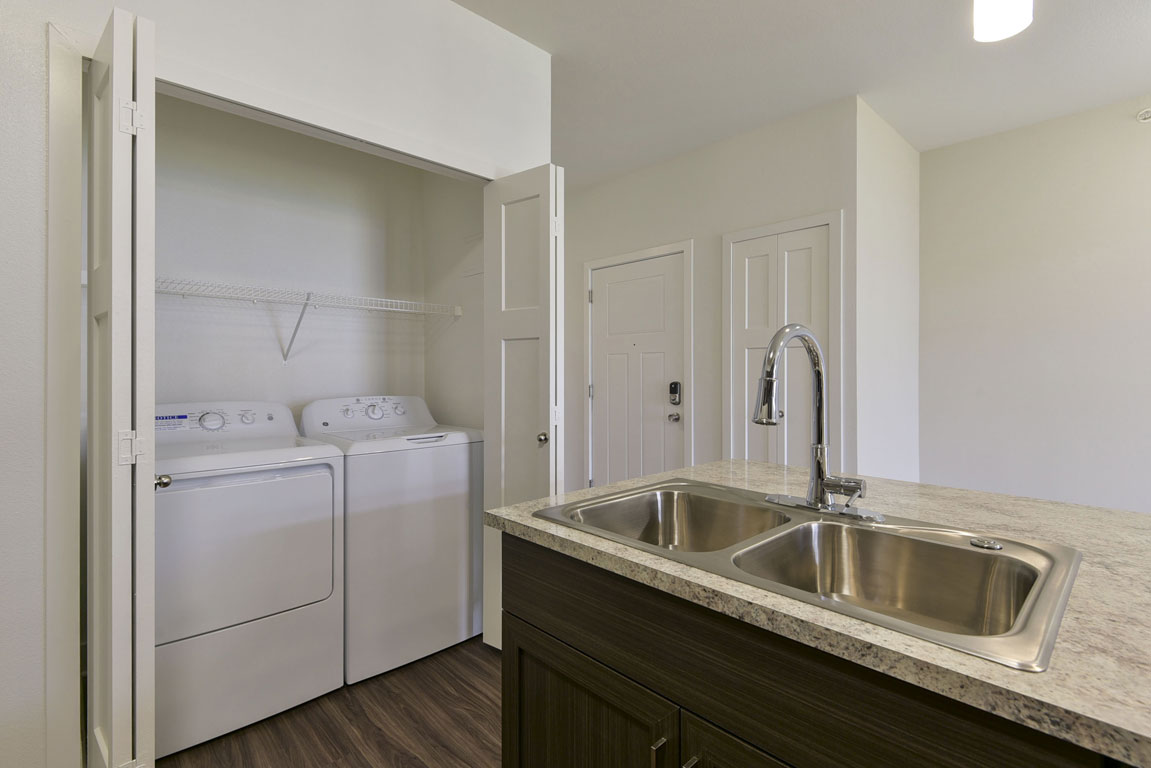 Laundry room at Dodson Pointe Apartment Homes (2 of 4)