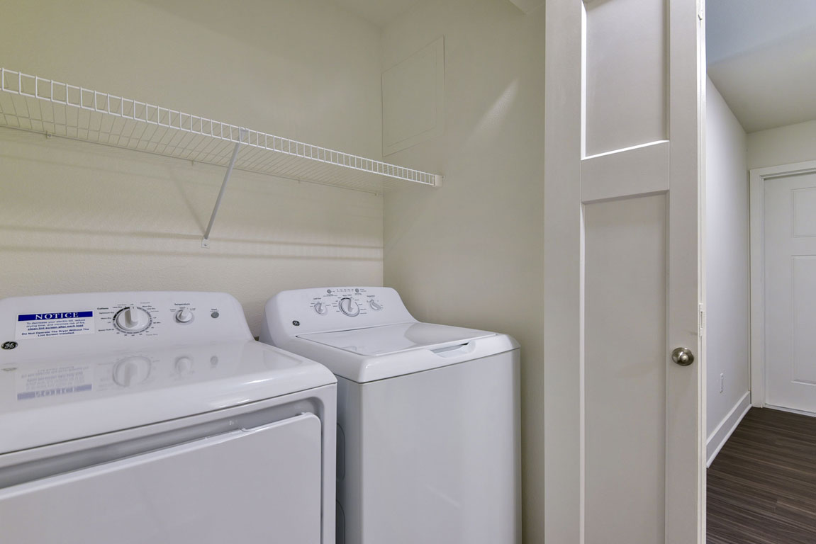 Laundry room at Dodson Pointe Apartment Homes (4 of 4)