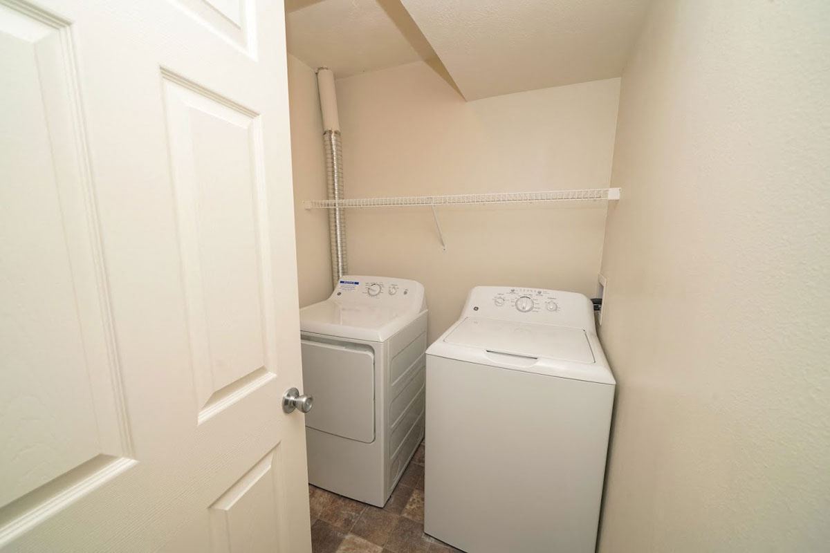 Laundry room at Arbor Lakes Apartments