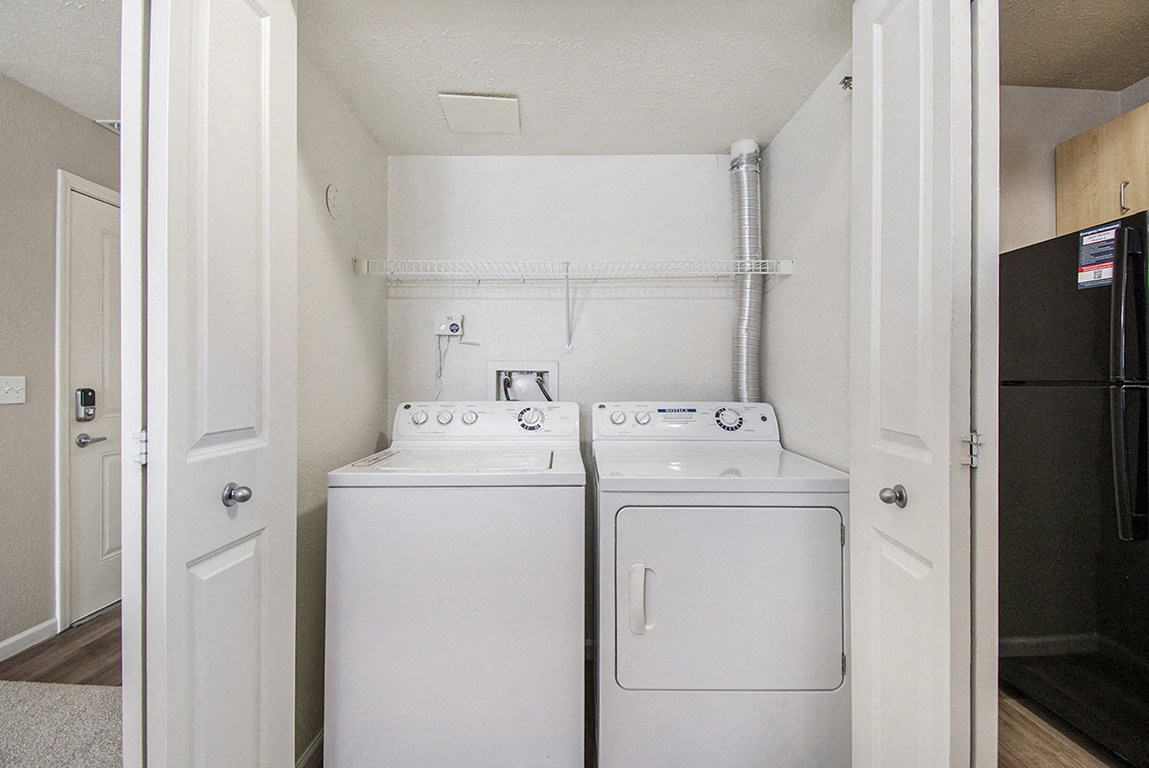 Laundry room at Lynbrook Apartments and Townhomes (2 of 3)