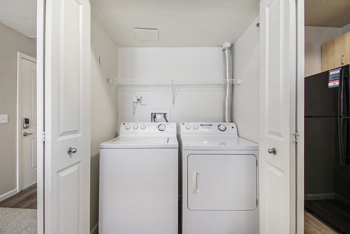 Laundry room at Lynbrook Apartments and Townhomes (1 of 3)