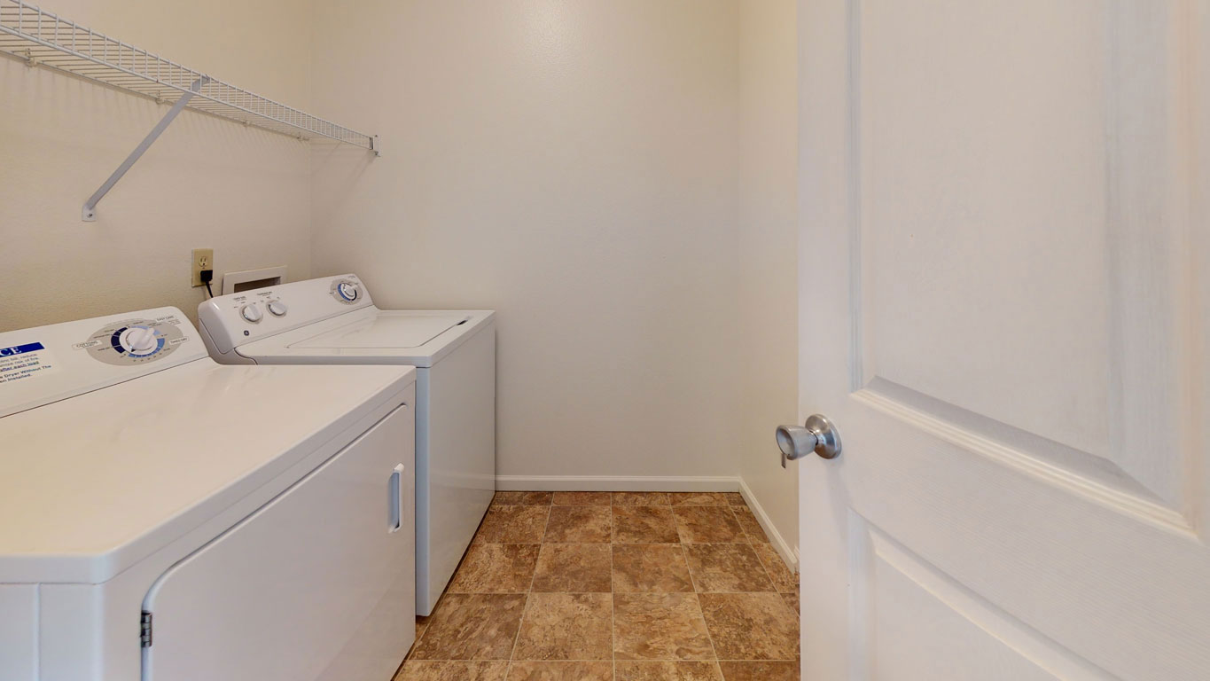 Laundry room at Tall Oaks Apartment Homes