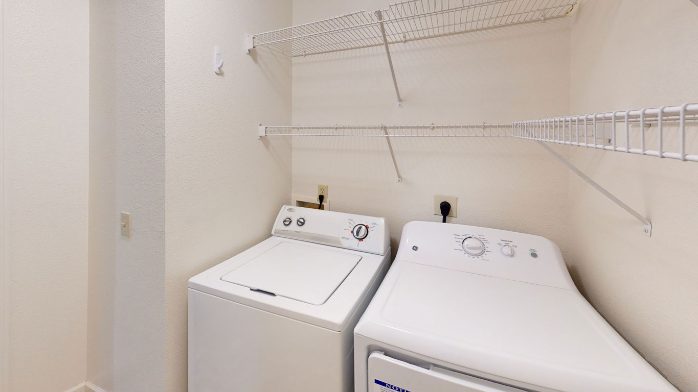 Laundry room at Tracy Creek Apartment Homes (1 of 2)