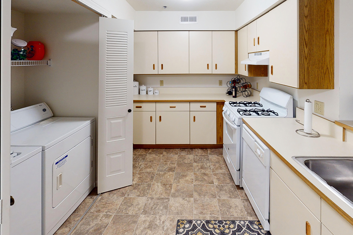 Laundry room at Tracy Creek Apartment Homes (2 of 2)