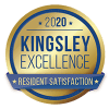 a blue and yellow sign that says kingsley excellence