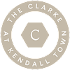 A beige sign with black text that says "The Clarke At Kendall Town".