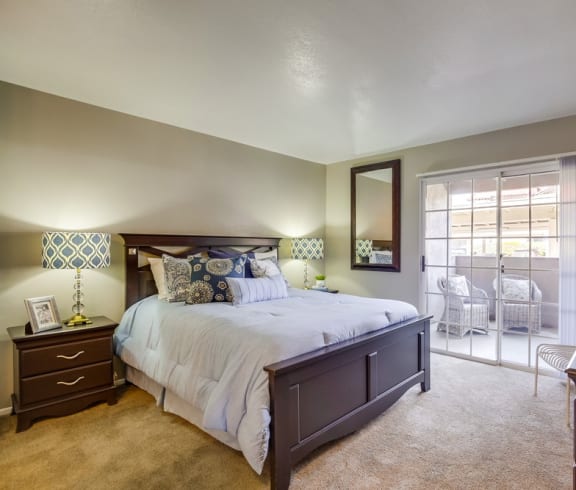 One-Bedroom Apartments in Temecula, CA- Vista Promenade- Wall-to-Wall Carpeting with Entrance to Patio and Stylish Decor at Vista Promenade Apartments, Temecula, CA, 92591