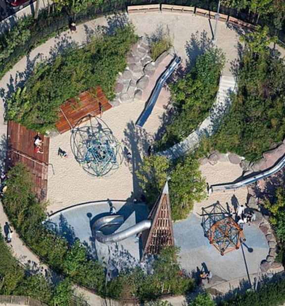 A playground with a slide, swings, and a climbing structure.