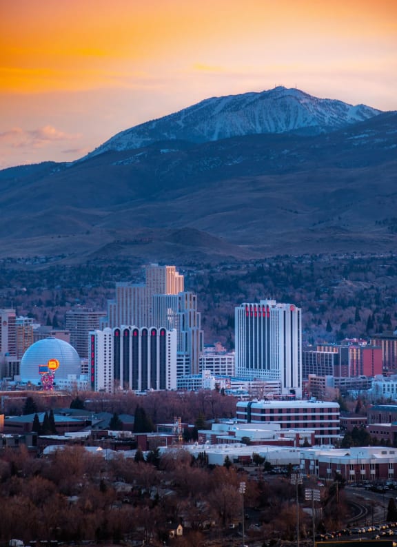 city of reno with mountain background