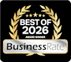 A black and gold award badge for BusinessRate.