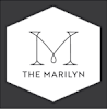 A logo with a hexagonal background and two champagne glasses.