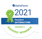 A badge indicating a property has won the 2021 Resident Satisfaction Award from Satisfacts.