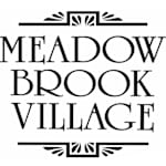 The image features the text "Meadow Brook Village" in a bold, black font.