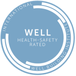 a blue and white circle with the words well health safety rated on it