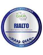 A blue and white award badge for the best marketing campaign in 2024.