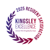 A circular logo with the words "Kingsley Excellence" surrounded by a laurel wreath.