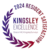 a circular logo with the words kingsley excellence with purple laurels