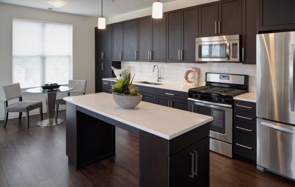 Elegant And Timeless Kitchen at Courthouse Square Apartments, Wheaton, IL