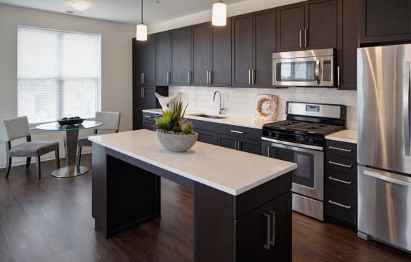 Elegant And Timeless Kitchen at Courthouse Square Apartments, Wheaton, IL