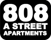 A black and white sign for 808 a street apartments.