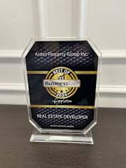 An award plaque for the best real estate developer of the year 2021.