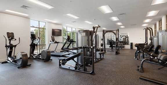 A spacious gym with a variety of equipment.at Copestone Apartments, Garden City, ID 59808